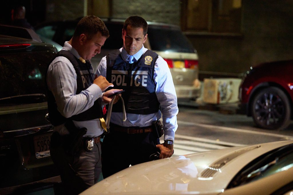 Police investigate the scene of a shooting in the Bronx Monday night. 