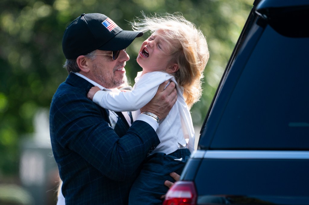 Hunter Biden picks up his son Beau Biden after arriving with President Joe Biden at Fort Lesley J. McNair after spending the weekend at Camp David.
