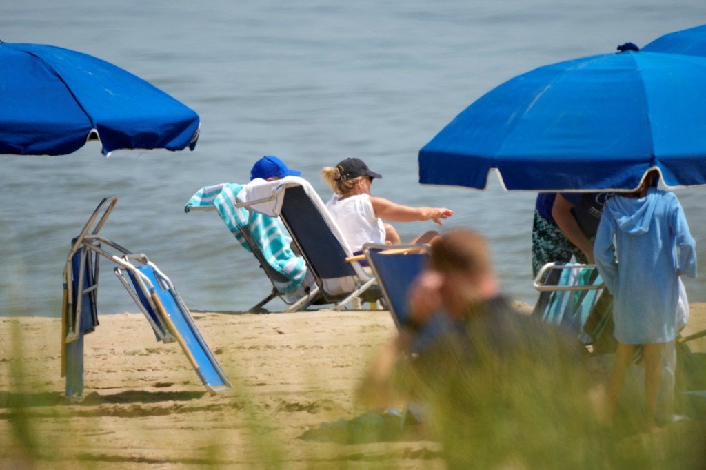 U.S. President Joe Biden and first lady Jill Biden sit, at Rehoboth Beach.