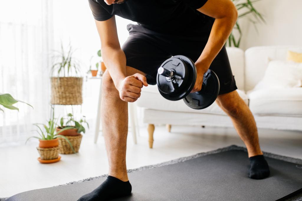 Someone working out with dumbbells.