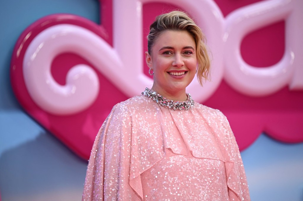 Greta Gerwig poses on the pink carpet upon arrival for the European premiere of "Barbie" in central London on July 12, 2023.