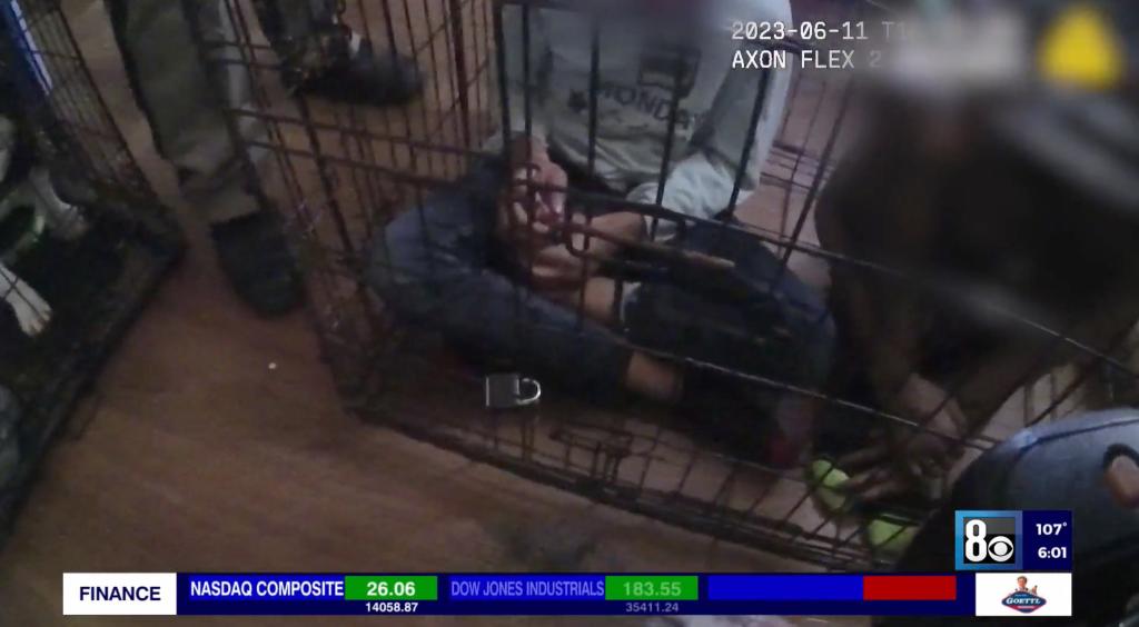 Video grabs from police body cam footage shown by KLAS shows Las Vegas Metro police rescuing six children a one-bedroom, one-bathroom extended-stay apartment near Flamingo Road and Valley View Boulevard.