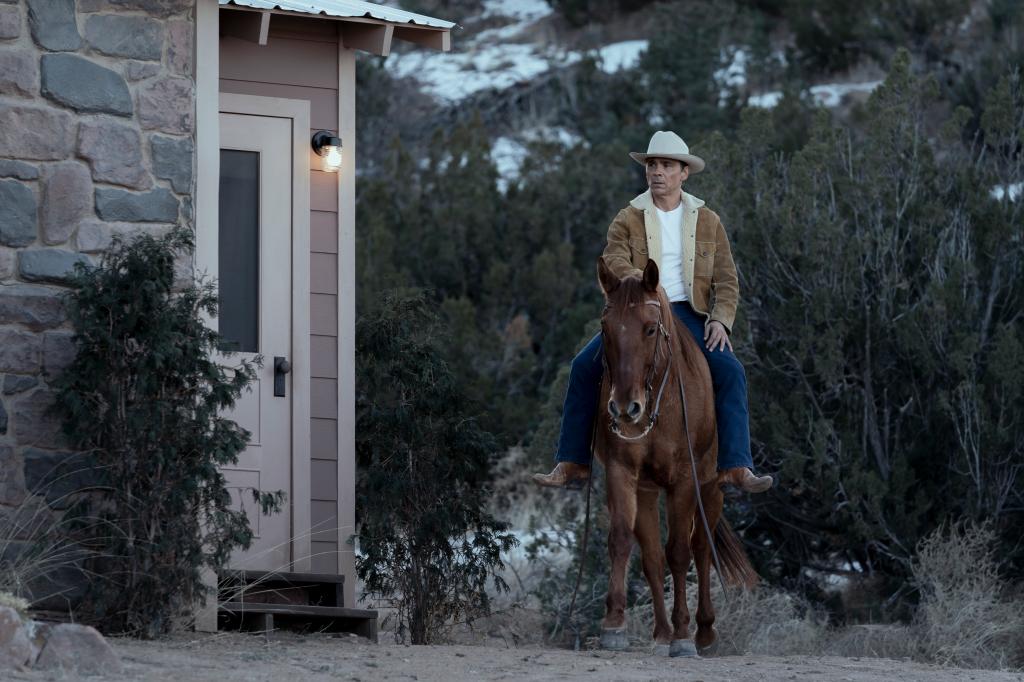 Zahn McClarnon sitting on a horse. 