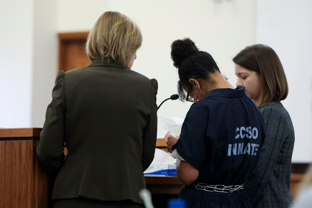 Elizabeth Archibeque reads a statement during her sentencing hearing in Coconino County's District 1 Courtroom Thursday, July 27, 2023