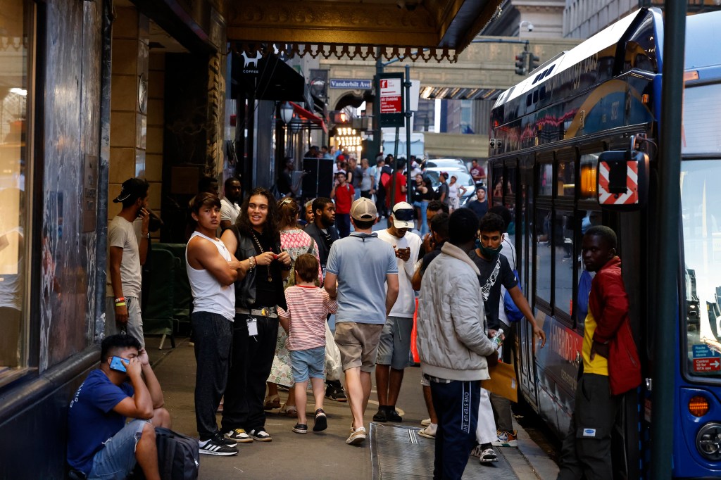 Migrants outside of the shelter at the Roosevelt Hotel in Manhattan on July 25, 2023.