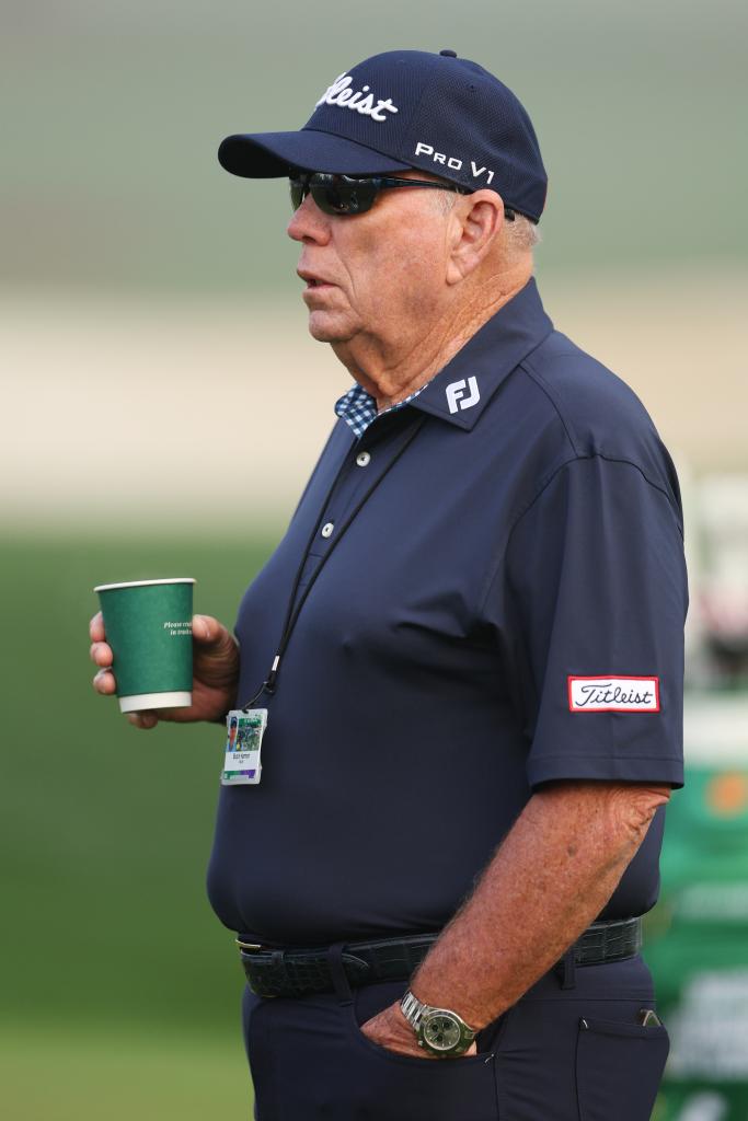 Swing coach Butch Harmon looks on from the practice area prior to the 2023 Masters