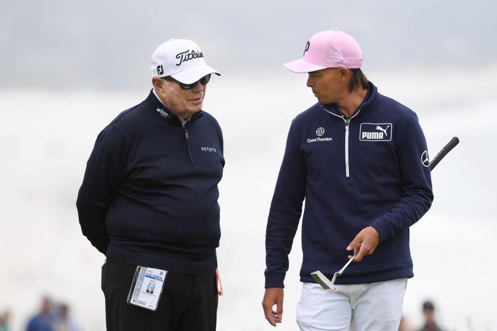 Butch Harmon and Rickie Fowler talk during a practice round prior to the 2019 U.S. Open