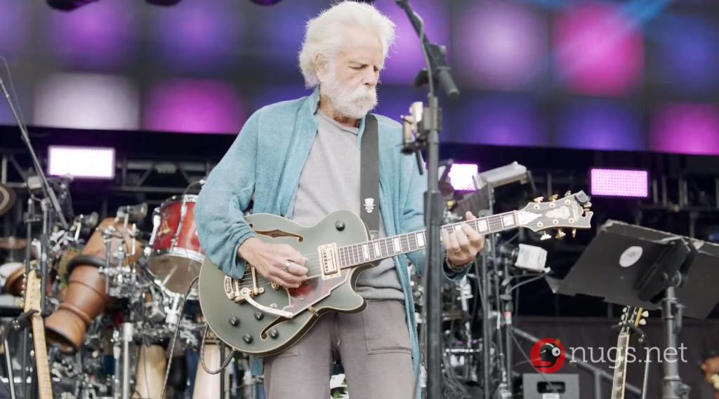 Bob Weir playing guitar.