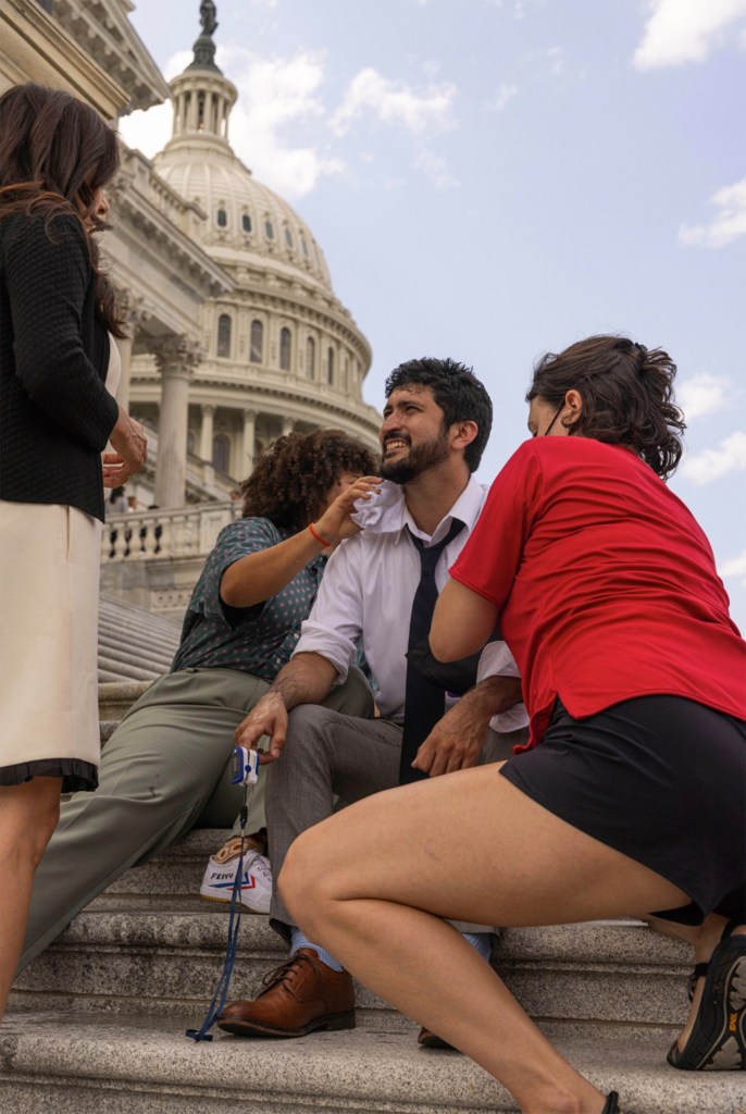 Casar sits on the steps of the US Capitol building during his thirst strike.