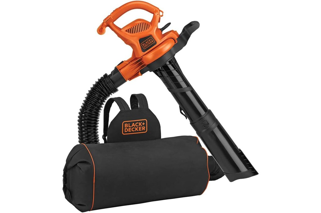 A black leaf blower with orange detailing with bag to carry.