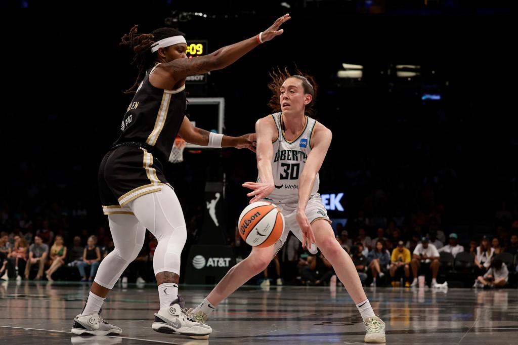 The Liberty's Breanna Stewart makes a pass during a game against the Washington Mystics.