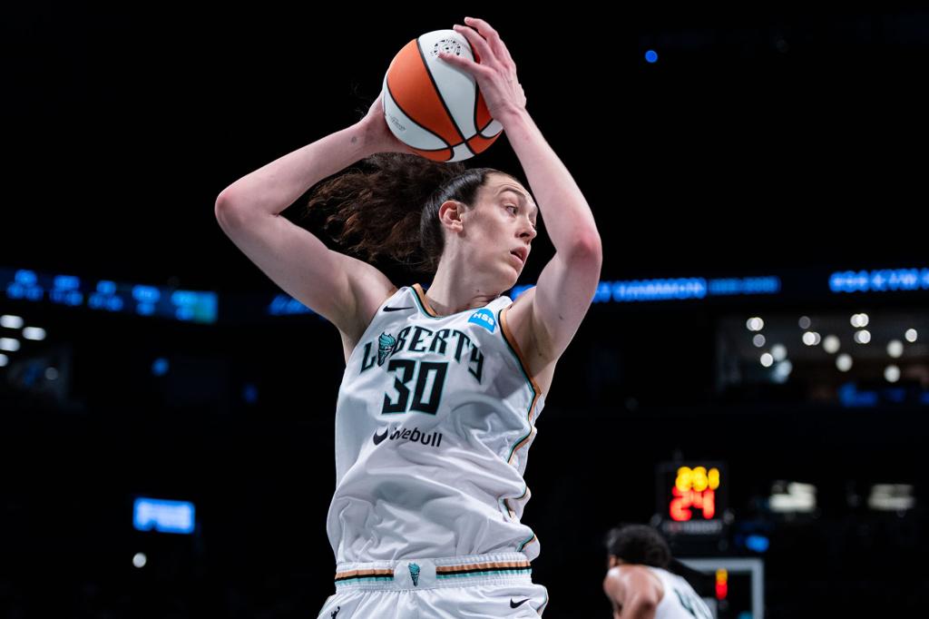 Breanna Stewart of the New York Liberty grabs a rebound.