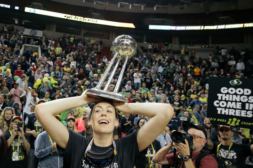 Breanna Stewart holds up the trophy after winning the 2018 title with the Seattle Storm.