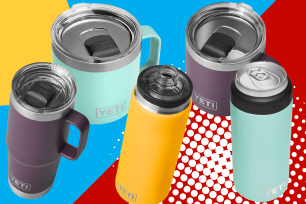 A collection of five purple, blue, and yellow insulated Yeti bottles and mugs.