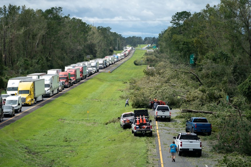 Workers were seen cleating I-10 after several trees fell over the highway.