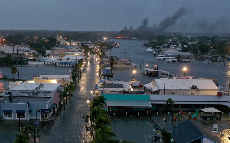 Smoke rising from a fire in Tarpon Springs during Hurricane Idalia.