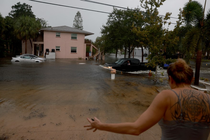 A truck attempting to pass through flooded streets in Tarpon Springs.