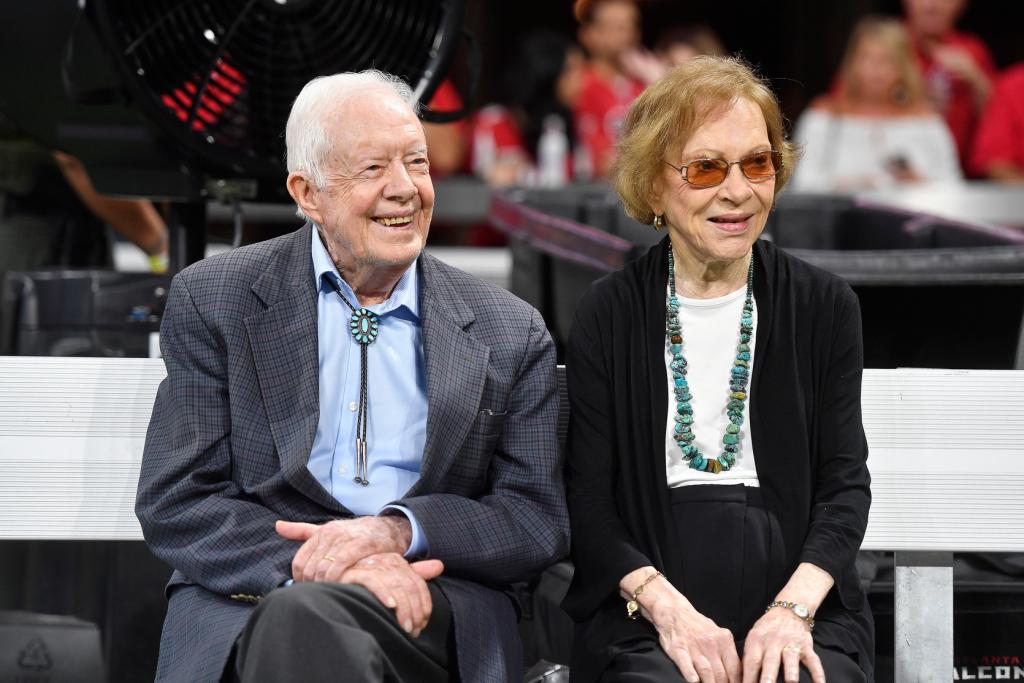 Carter's nephew says his grandfather, pictured with his Rosalynn at an NFL game in 2018, is almost 99 and is tired.