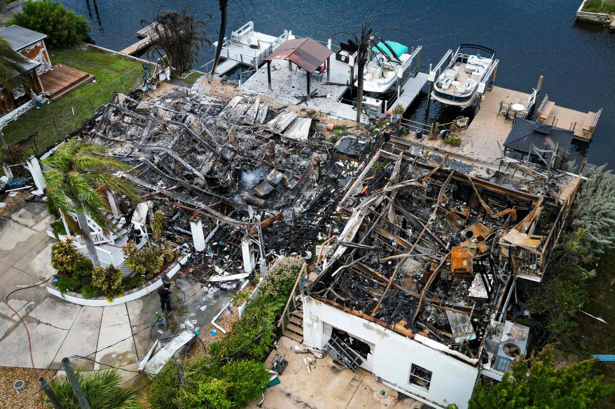 An aerial view shows home damaged after Hurricane Idalia wrecked havoc in Florida.