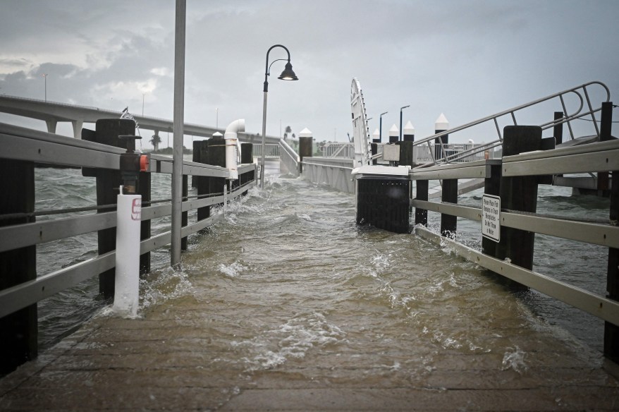 A flooded boardwalk at the Clearwater Harbor Marina in Clearwater.