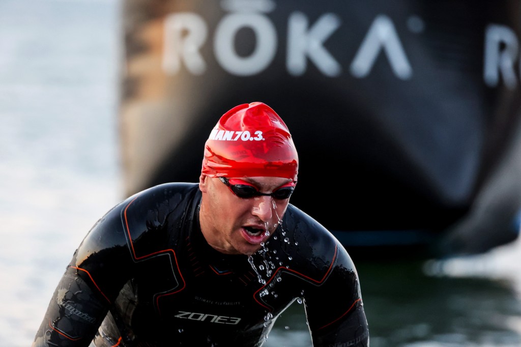 Athletes exit the swim section at IRONMAN 70.3 Ireland Cork on August 13, 2022