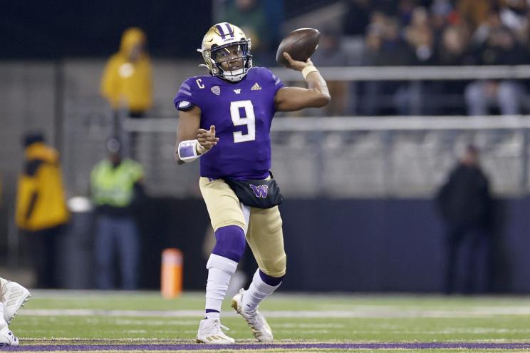 Michael Penix Jr. of the Washington Huskies passes during a game against the Colorado Buffaloes.