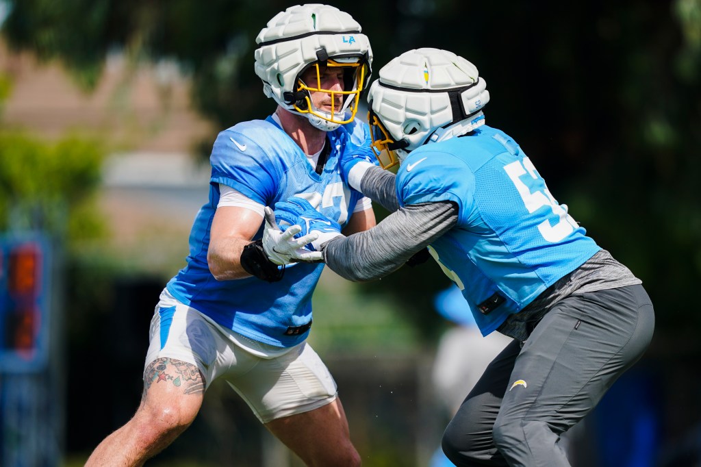 Los Angeles Chargers linebackers Joey Bosa, left, and Khalil Mack participate in drills.