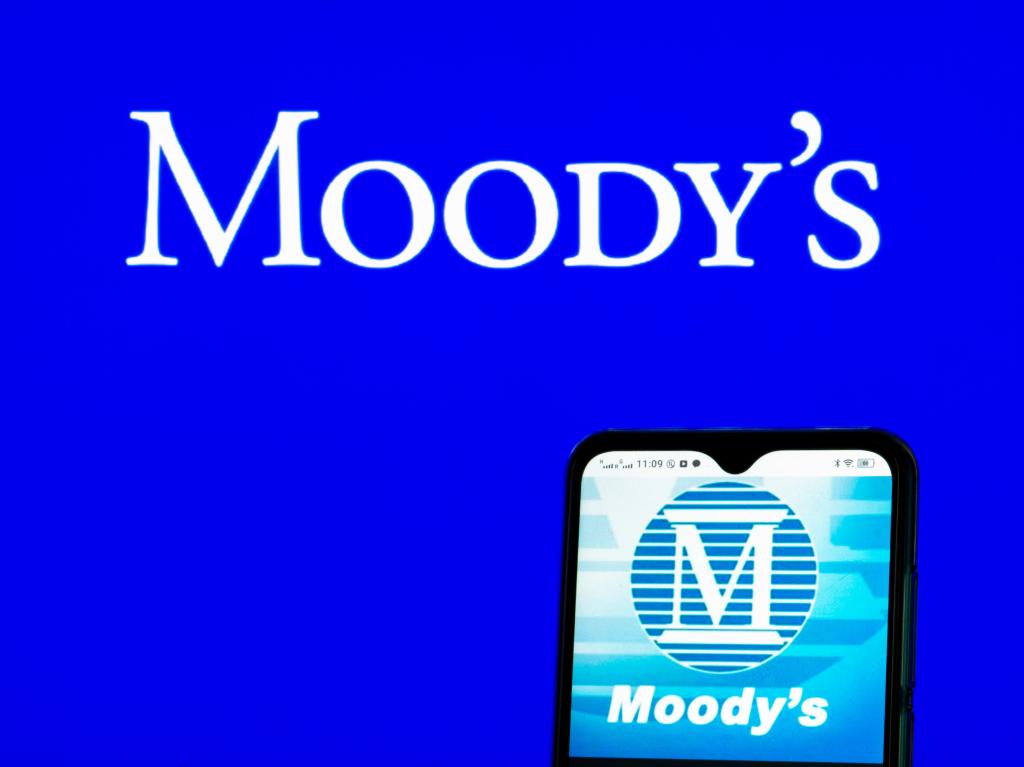 Moody's Investors Service lowered the ratings for 10 small and midsize banks.