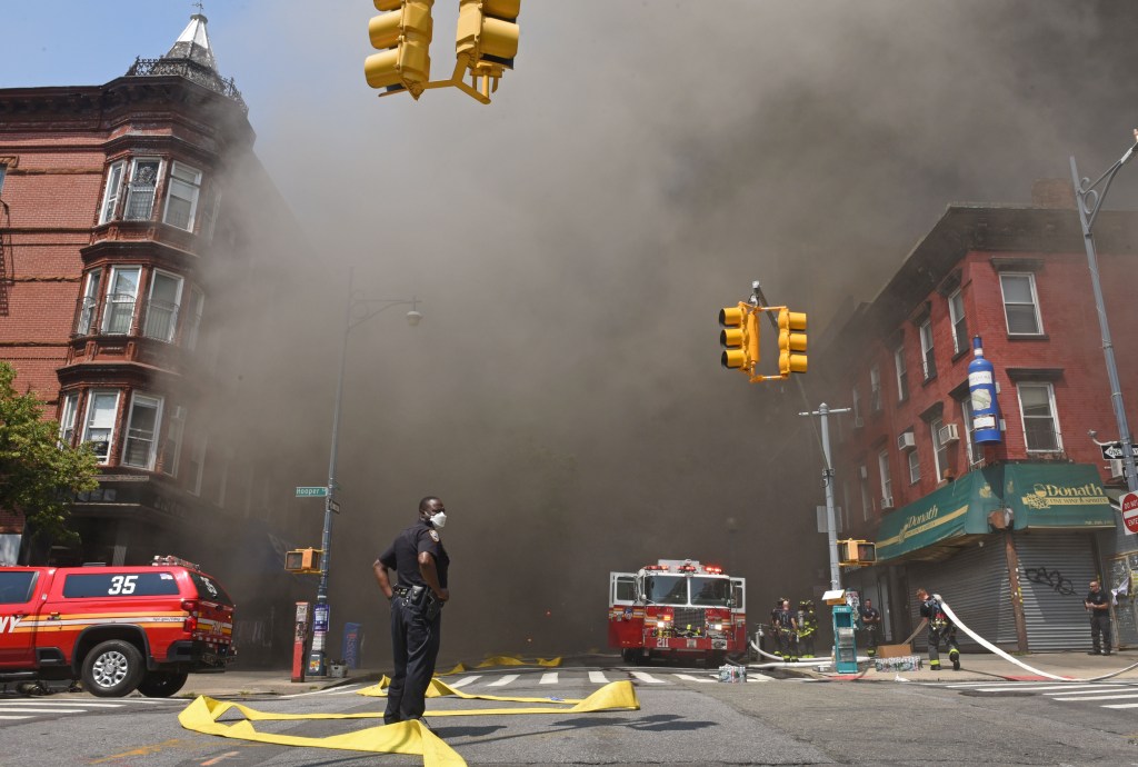 Smoke filling the street on Lee Avenue during the fire.