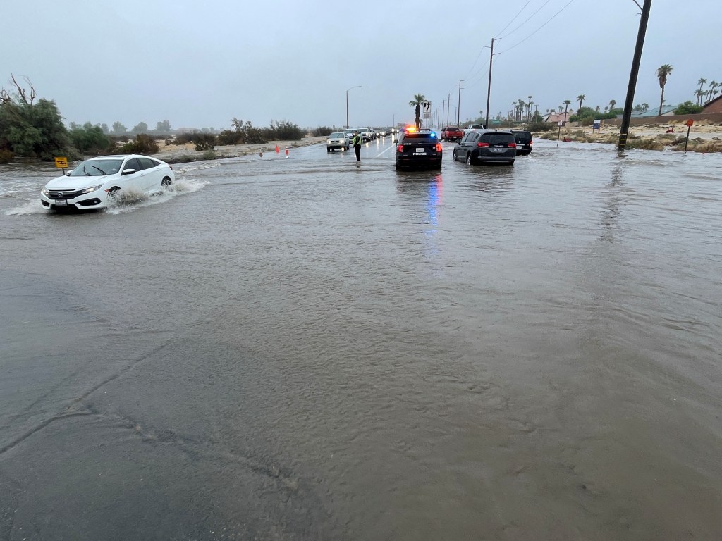 A flooded intersection in Palm Springs, California at Tropical Storm Hilary approaches southern California on August 20, 2023.