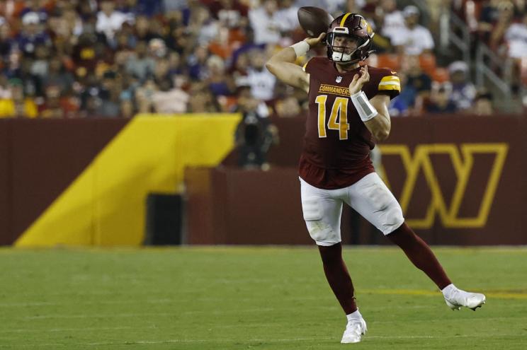 Sam Howell passes during the Commanders-Ravens preseason game.