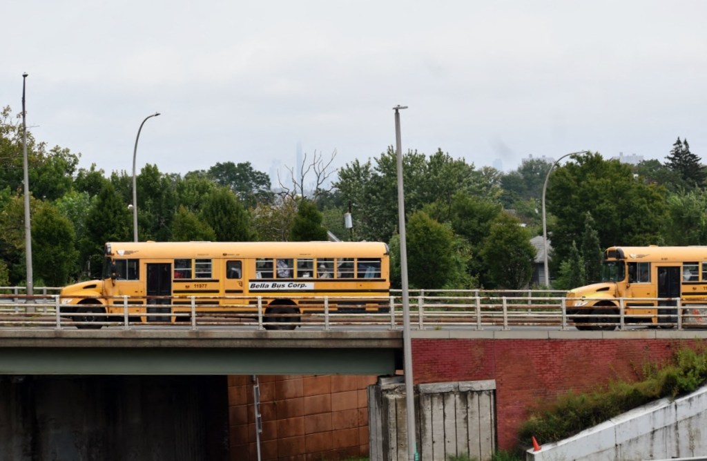 Migrants arrive at St. Villa Academy migrant shelter.