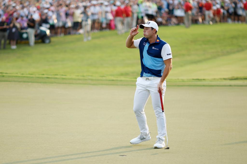 Viktor Hovland celebrates winning the FedEx Cup on Sunday.