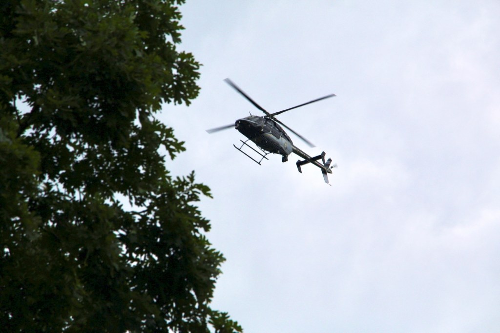 A police helicopter seen above the campus during the lockdown.