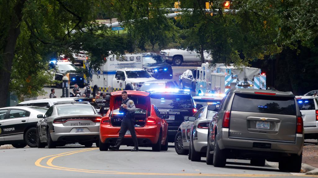 Police responding to the reported armed person on the UNC campus.