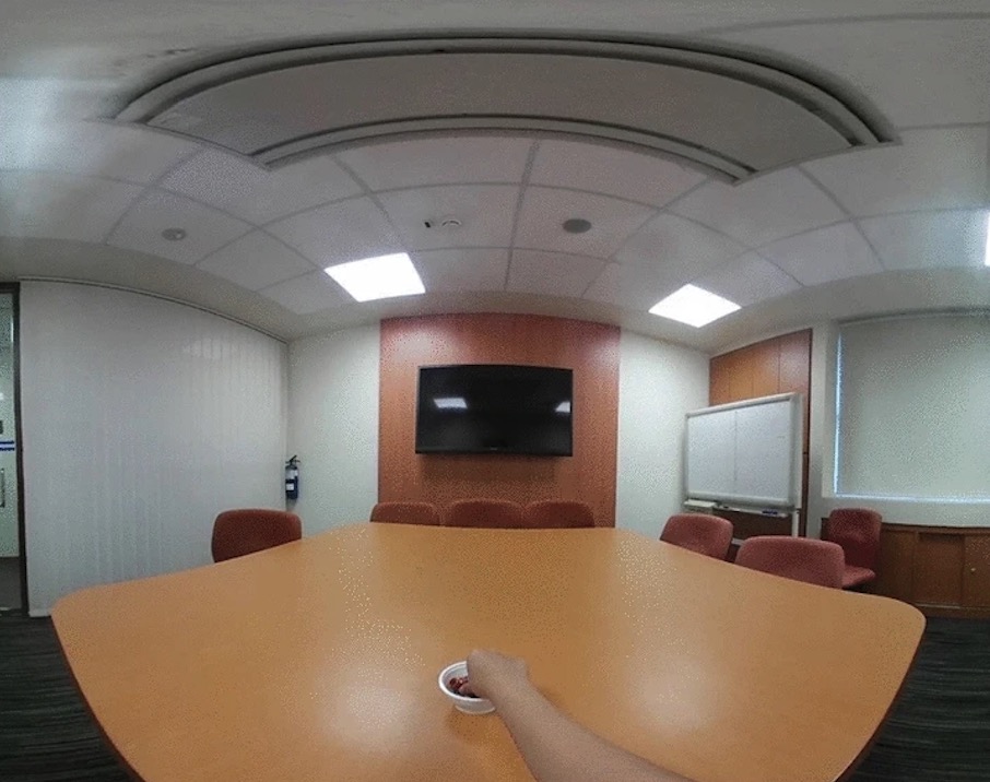 Screenshots depicting first-person 360-degree videos of an M&M being consumed