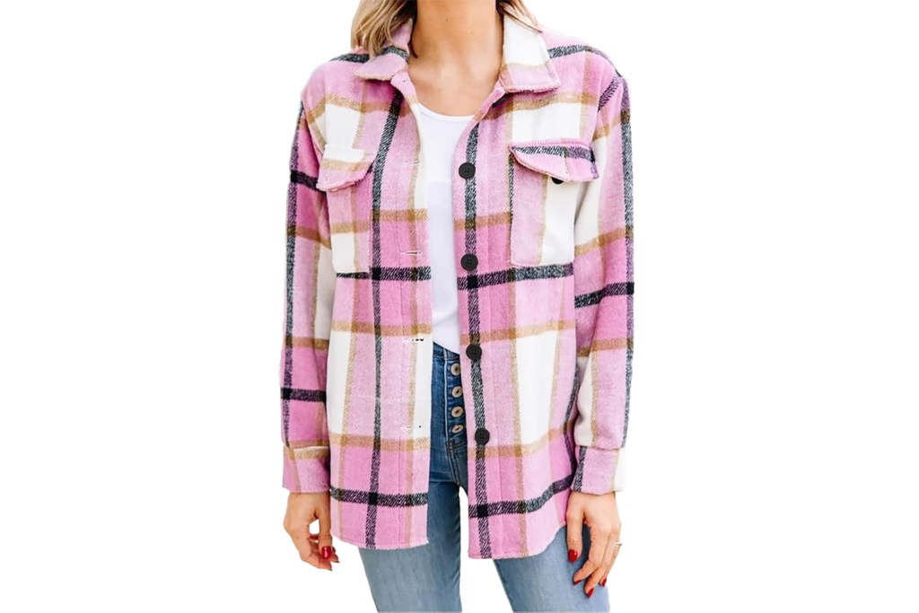 A woman wearing a pink and white plaid flannel shirt