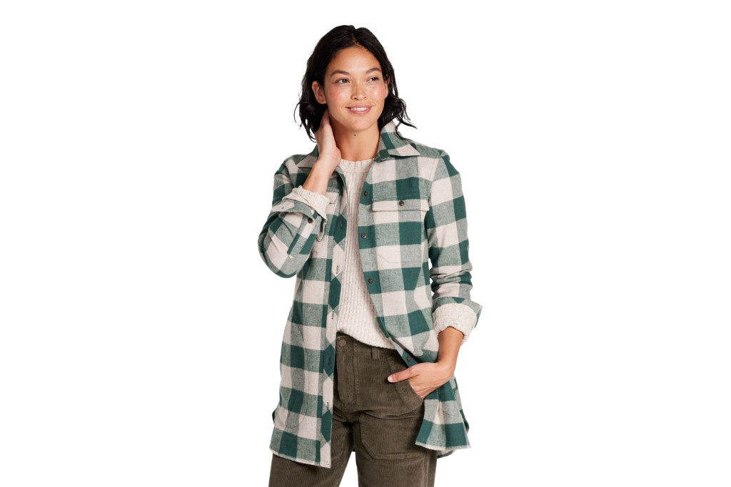 A woman in a plaid shirt