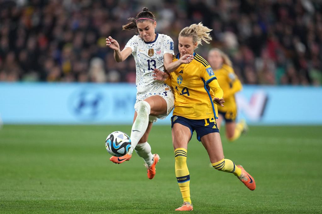 Alex Morgan #13 of the United States plays the ball under pressure from Nathalie Björn #14 of Sweden during extra time of the FIFA Women's World Cup Australia & New Zealand 2023 Round of 16 match between Sweden and the United States at Melbourne Rectangular Stadium on August 06, 2023 in Melbourne, Australia.