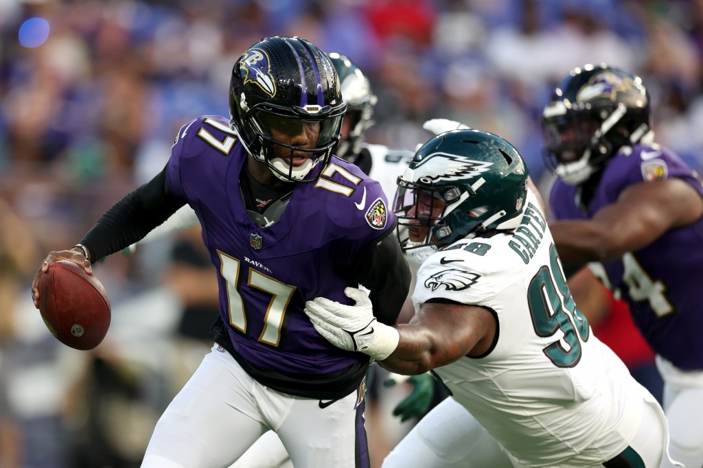 Jalen Carter tackles backup quarterback Josh Johnson. 