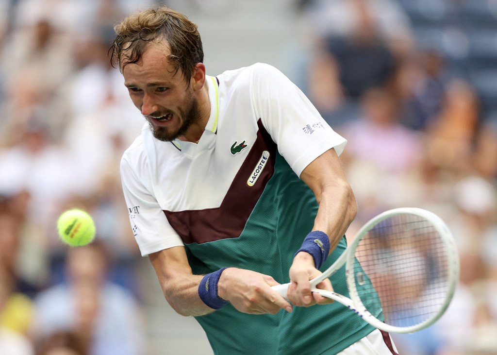 Daniil Medvedev returns a shot against Andrey Rublev during their Men's Singles Quarterfinal match on Day Ten of the 2023 US Open at the USTA Billie Jean King National Tennis Center on September 06, 2023 in the Flushing neighborhood of the Queens borough of New York City.