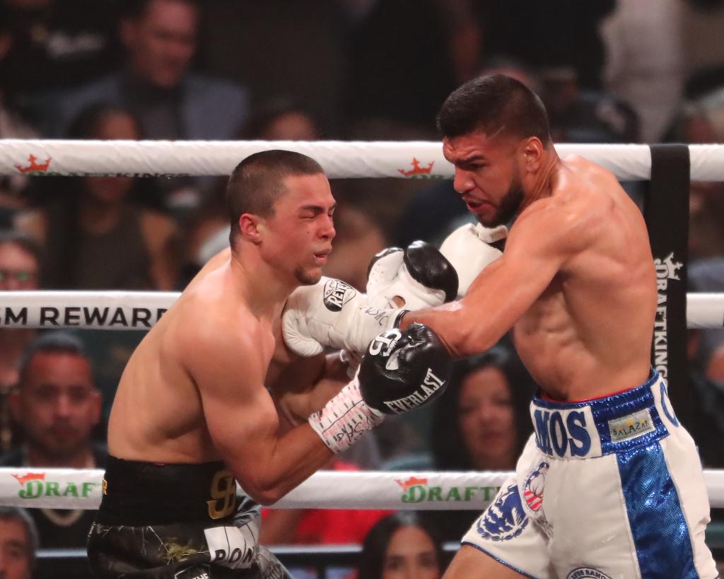 Jesus Ramos (R.) punches Joseph Spencer during his last bout on March 25. 