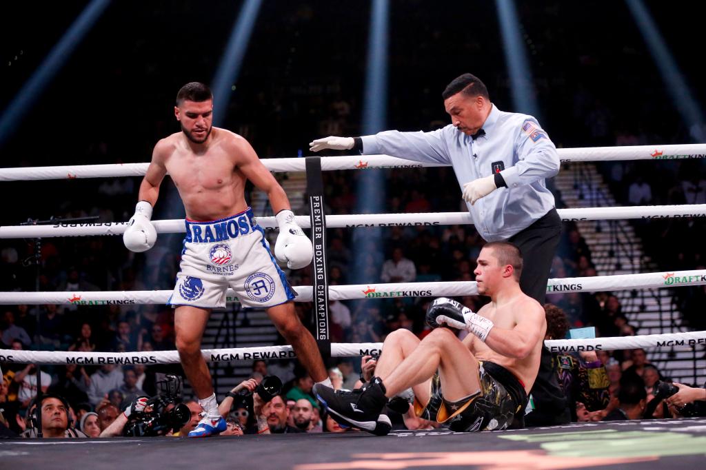 Jesus Ramos (L.) knocks down Joseph Spencer during his last bout on March 25. 