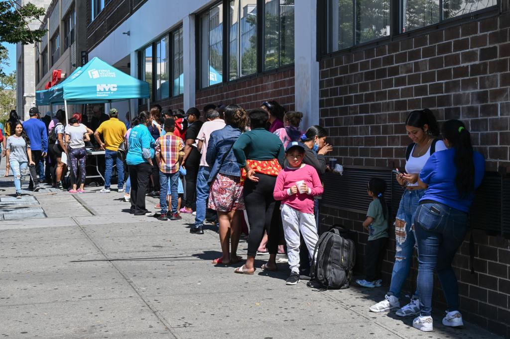 People lining up outside Department of Education Welcome Centers.