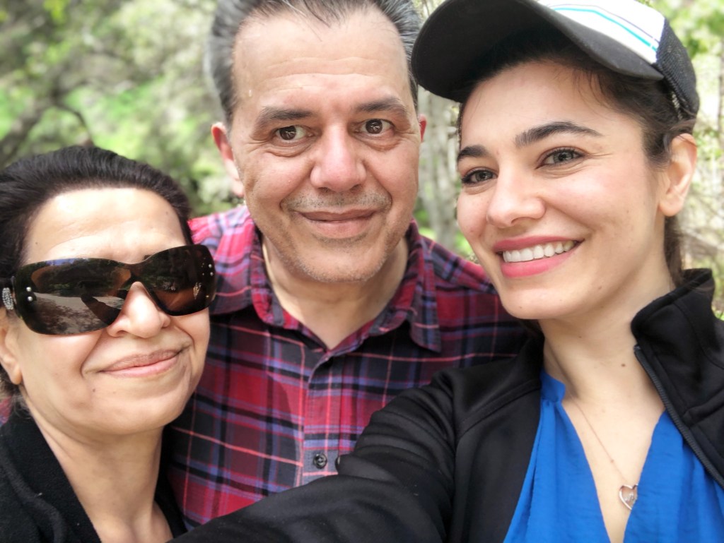 Jamshid (center) with daughter Gazelle (r) and his wife during happier times.  His family says his health is rapidly declining. 