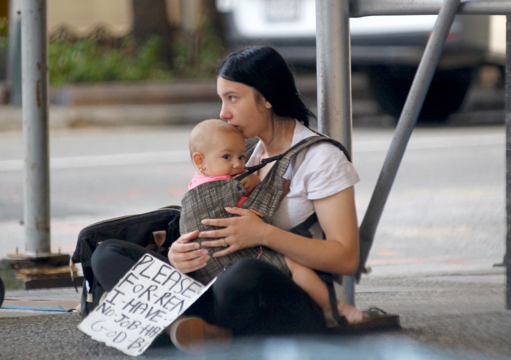 A Russian immigrant woman with her baby in Manhattan on September 2, 2023.