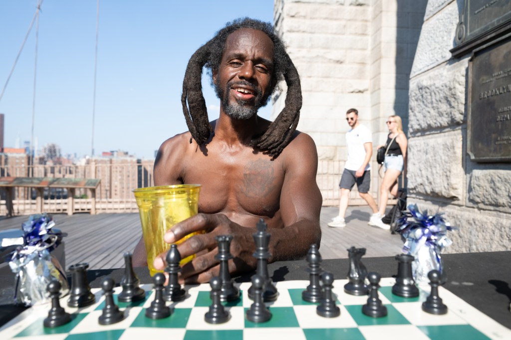 Man playing chess on the bridge