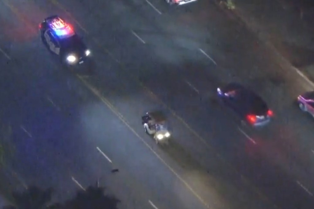 Golf cart seen being pursued by a police vehicle in San Fernando Valley Sunday 