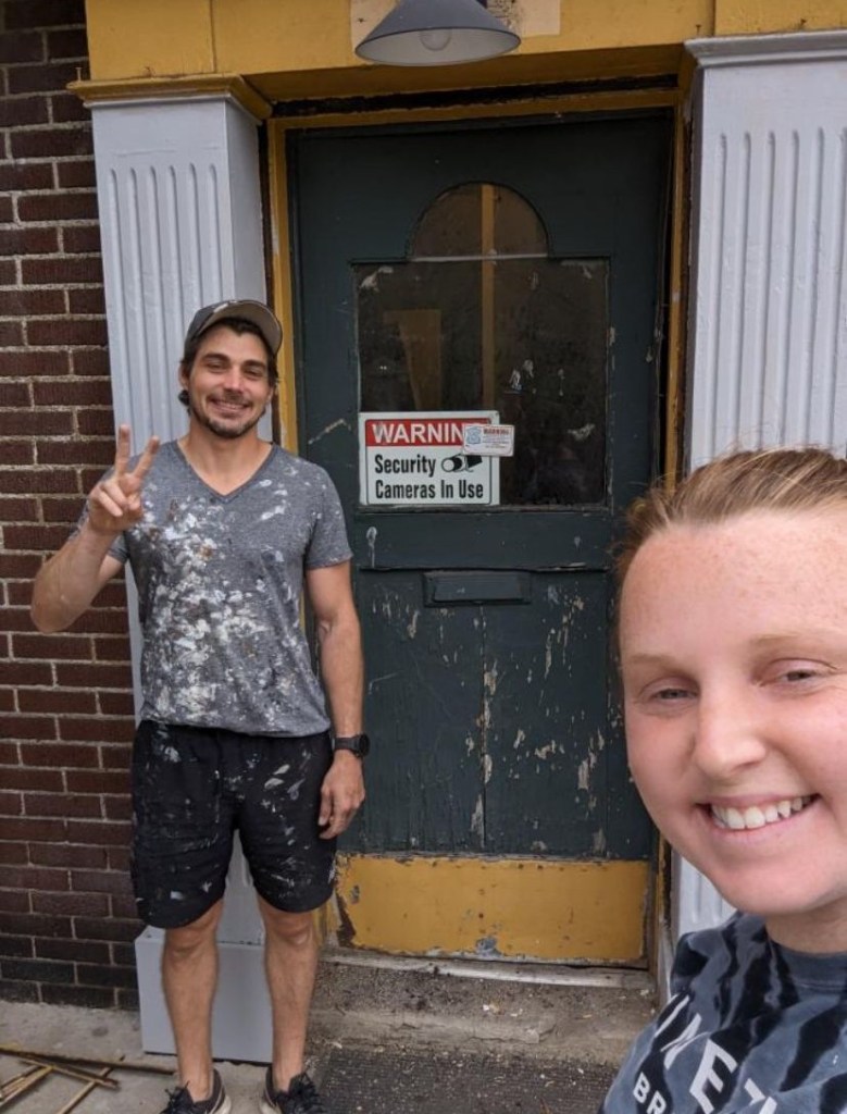 Markie Mullins and her boyfriend, Milo Birk and their door before it was repainted.