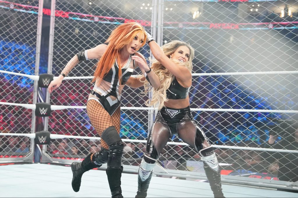 Becky Lynch and Trish Stratus battle in a cage match at Payback.